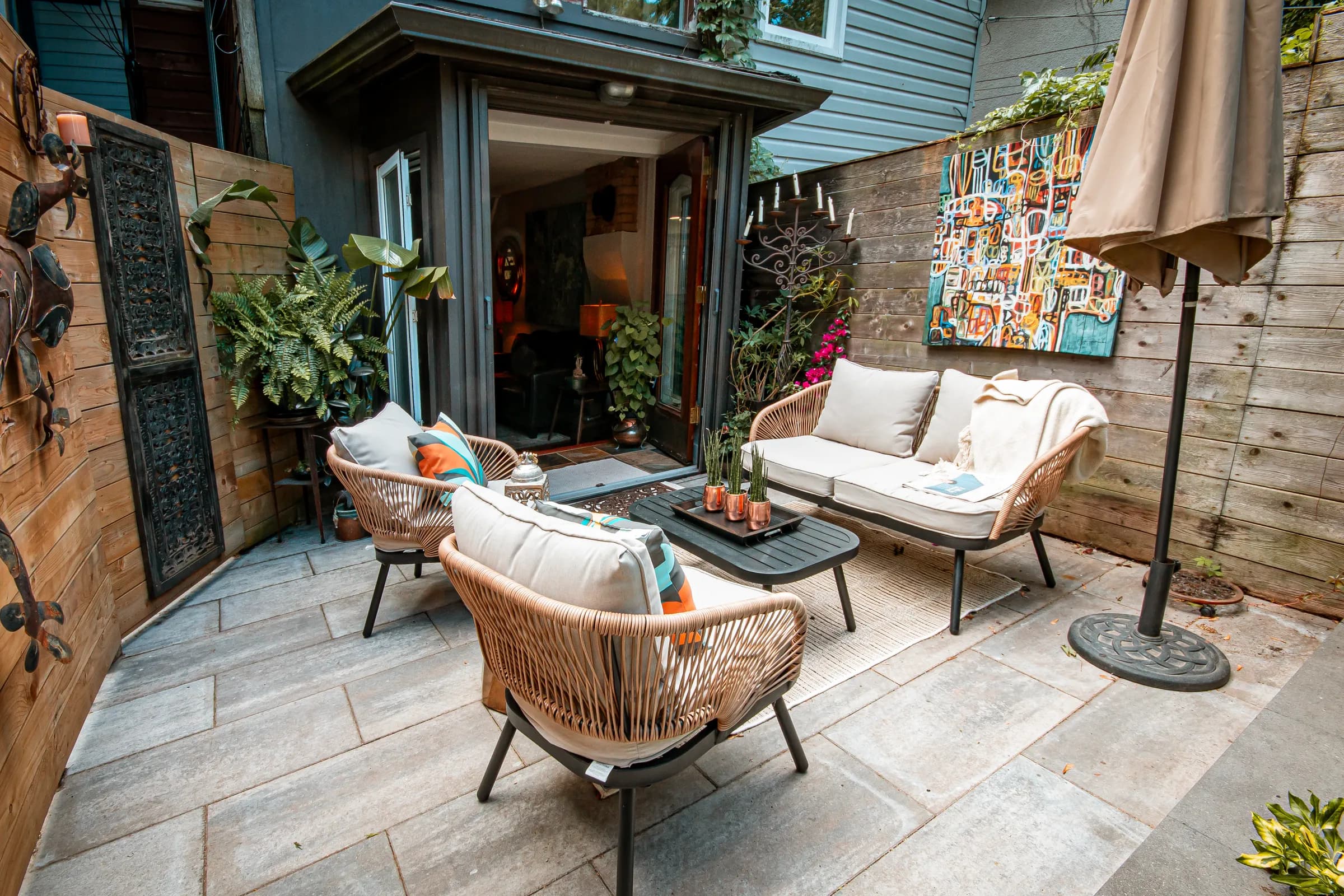 Private garden and seating area behind the townhome