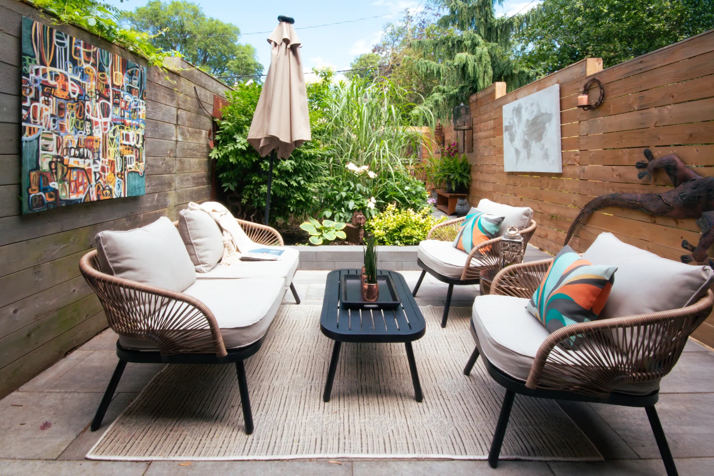 Landscaped city backyard with lush planting