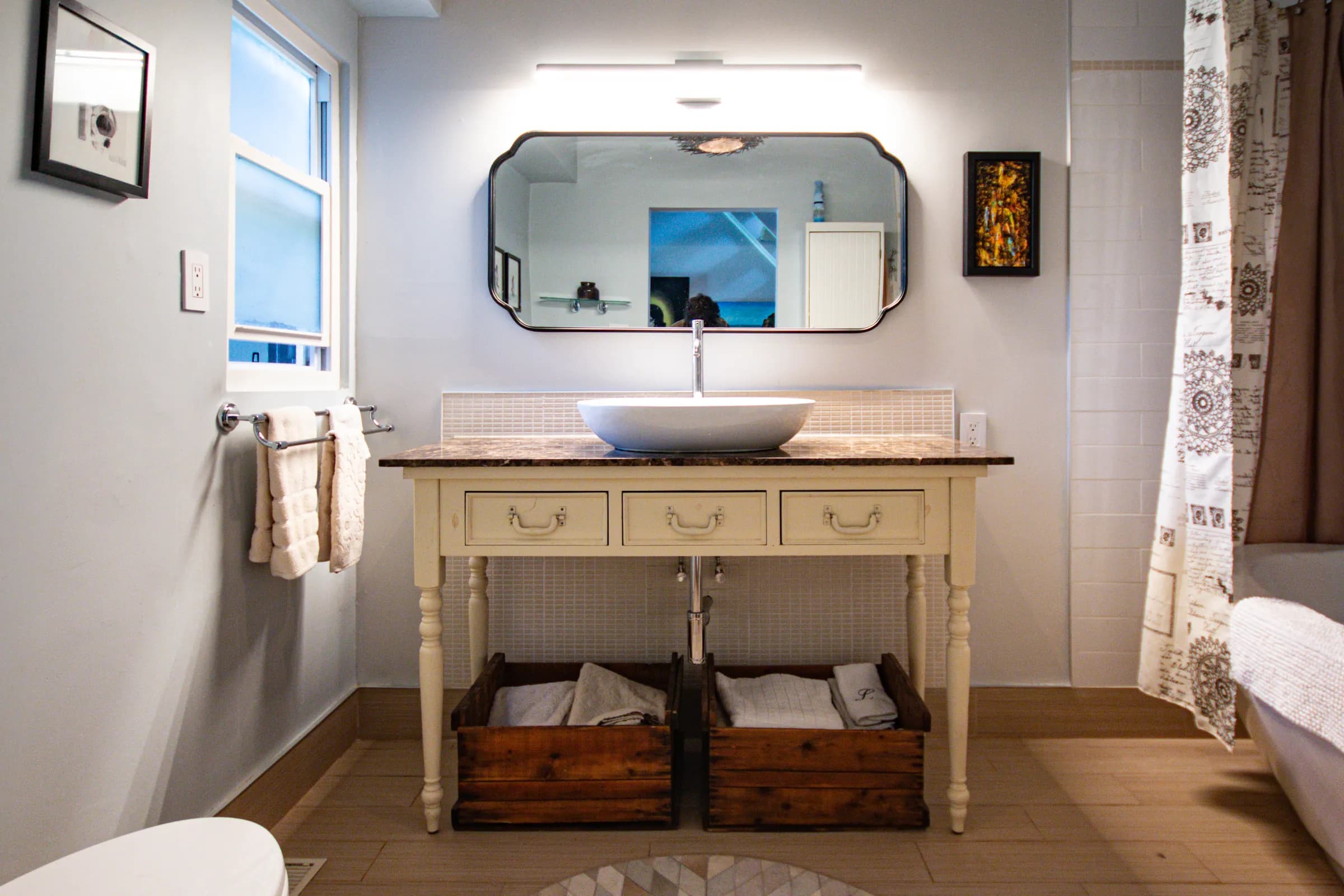 Renovated bathroom with tiled finishes