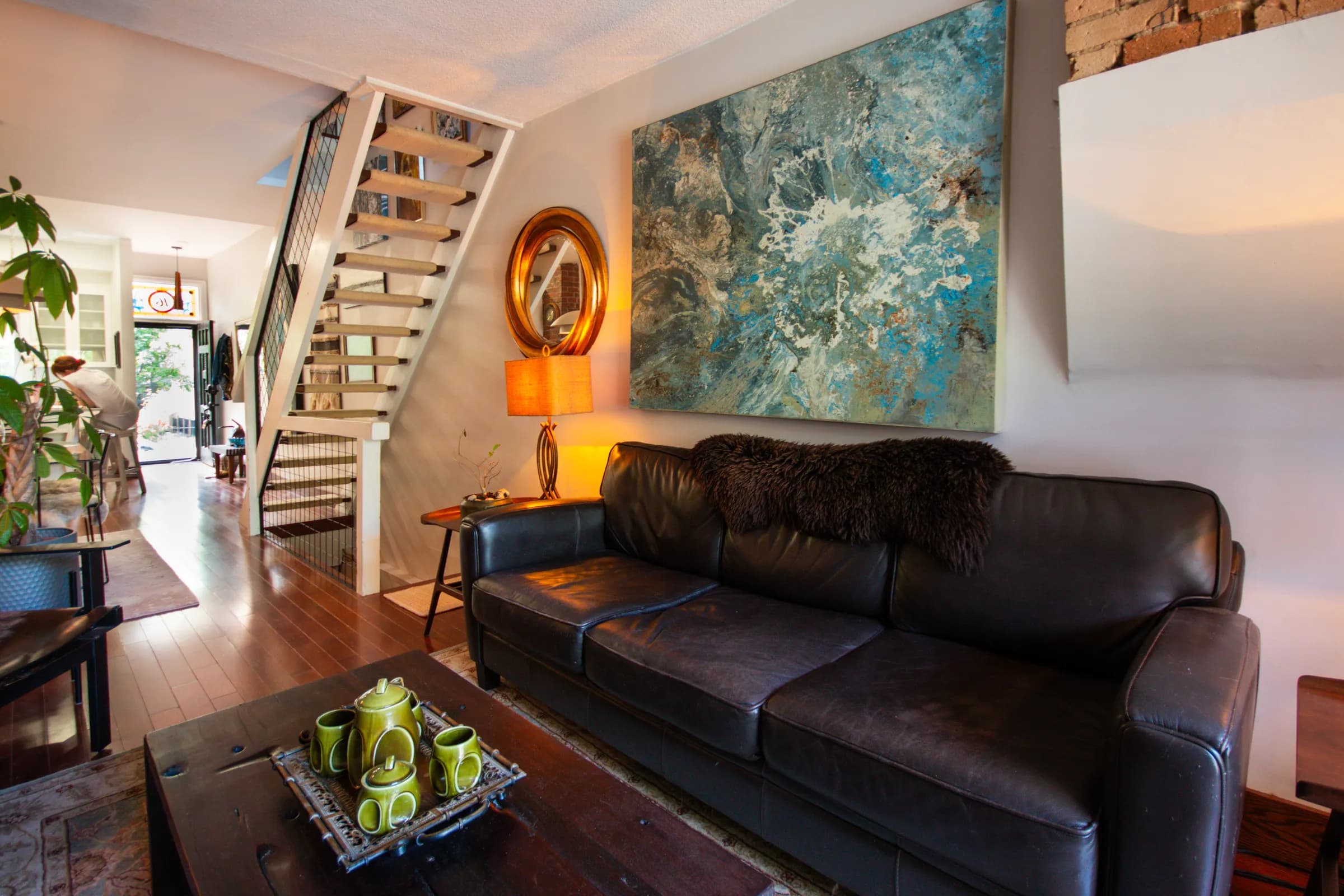 Living area with designer lighting and art