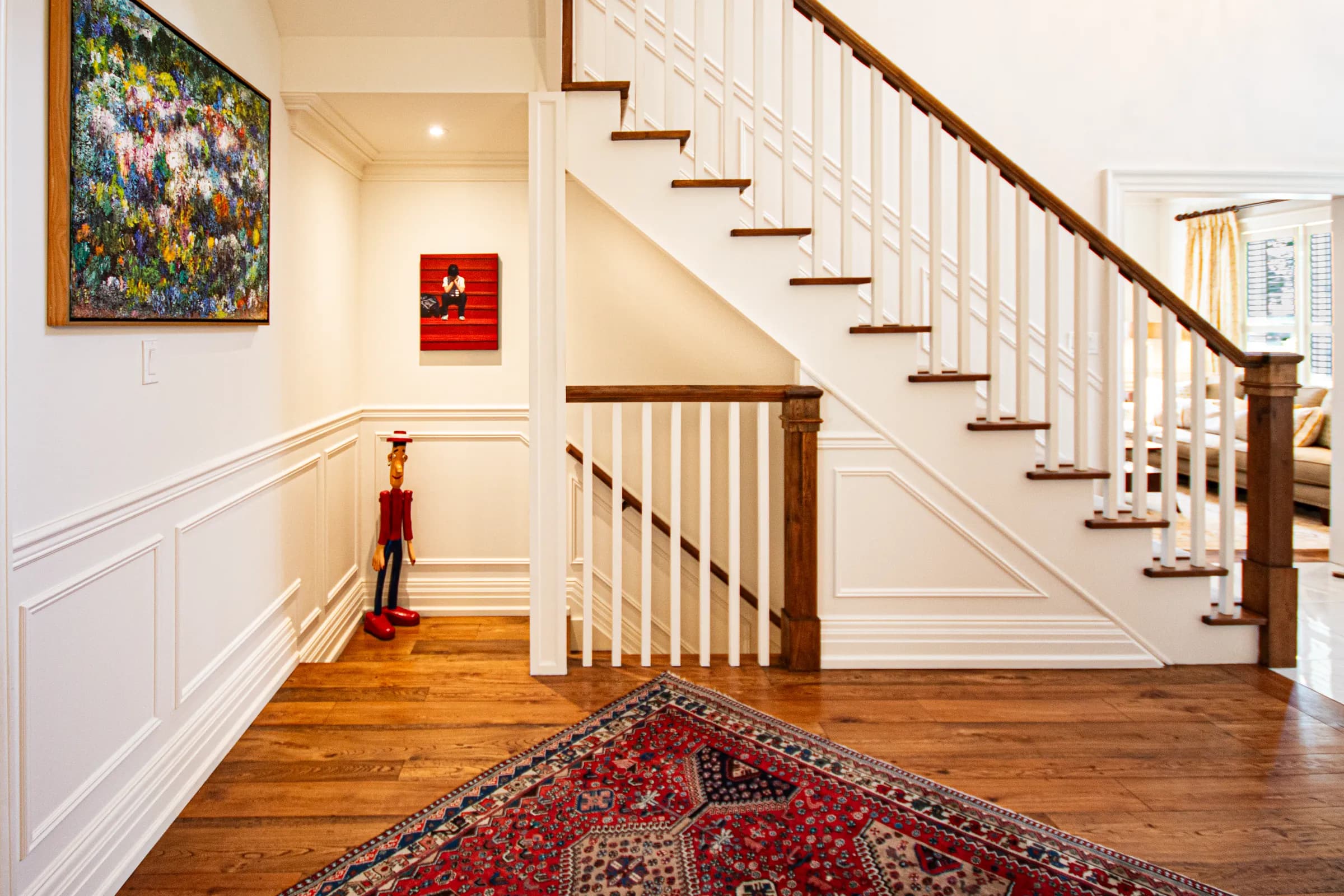 Welcoming foyer with hardwood floors