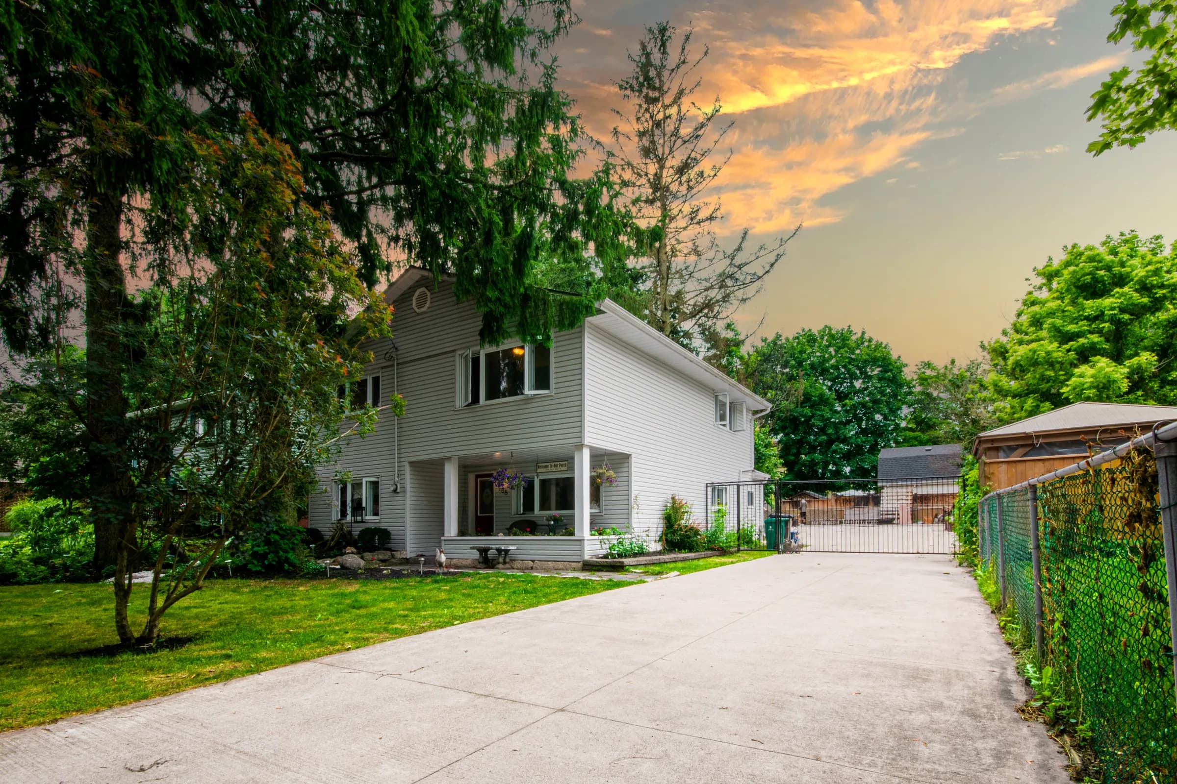 Home at twilight with a warm sky
